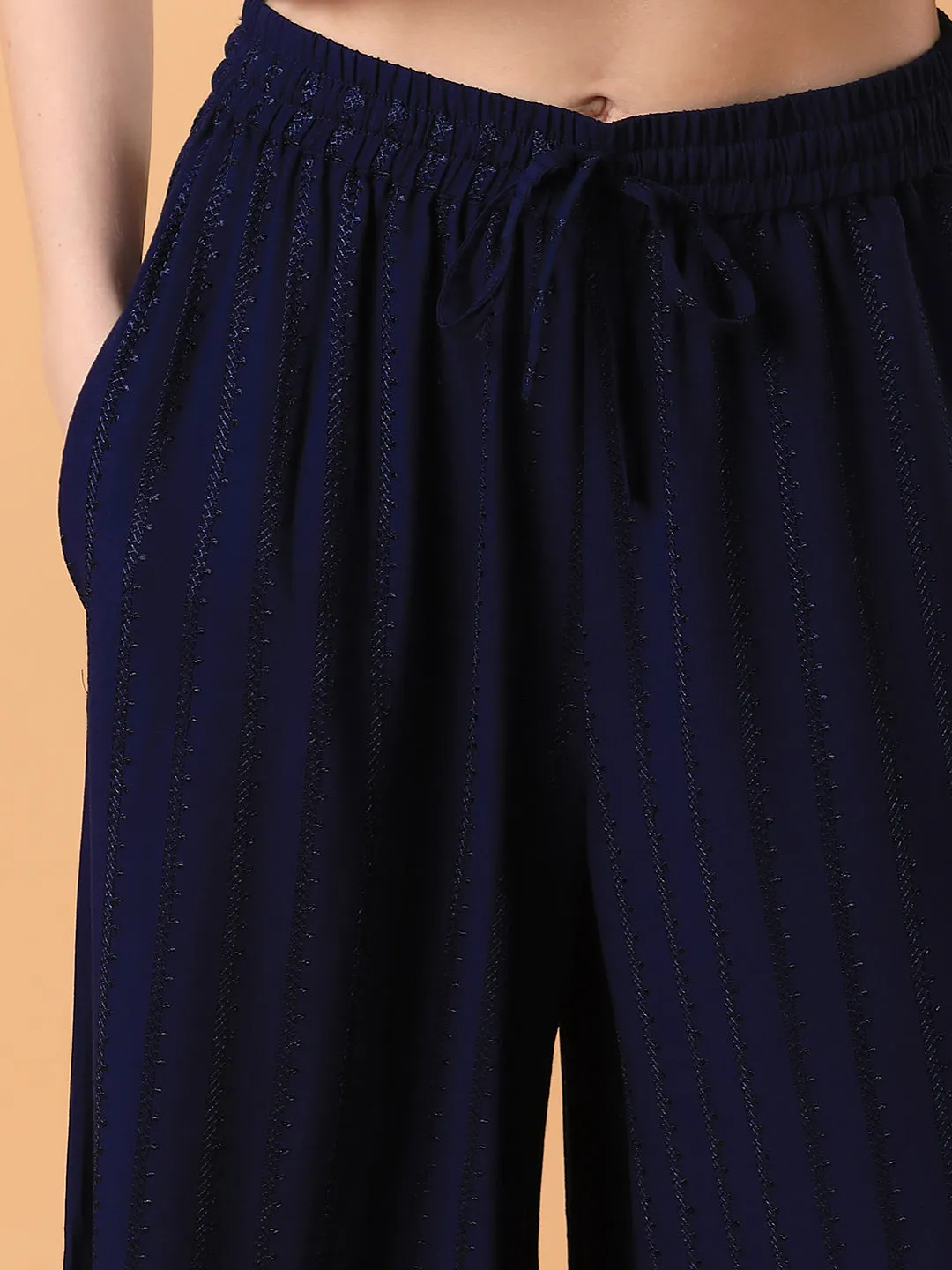 Women Navy Blue Solid Pleated Loose Fit Trouser